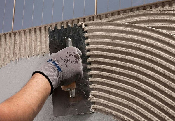 MAPEI Keraflex Extra S1 tenkovrstvé cementové lepidlo pro dlažbu a obklad aplikace